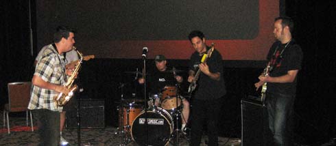 Chad Fowler jams on sax at RailsConf 2010.